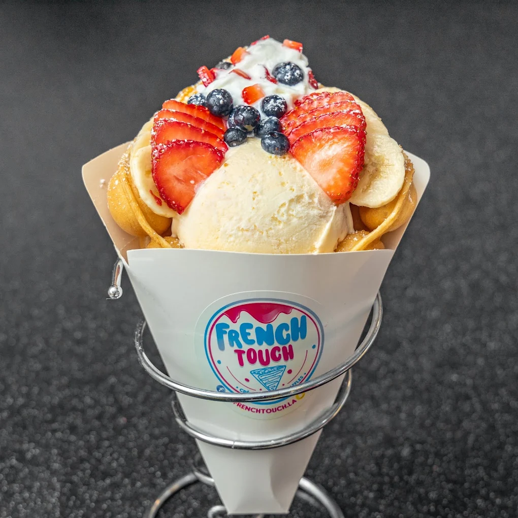 Catering-style Bubble Waffle cone with vanilla ice cream and fresh strawberries, available for events in South Bay