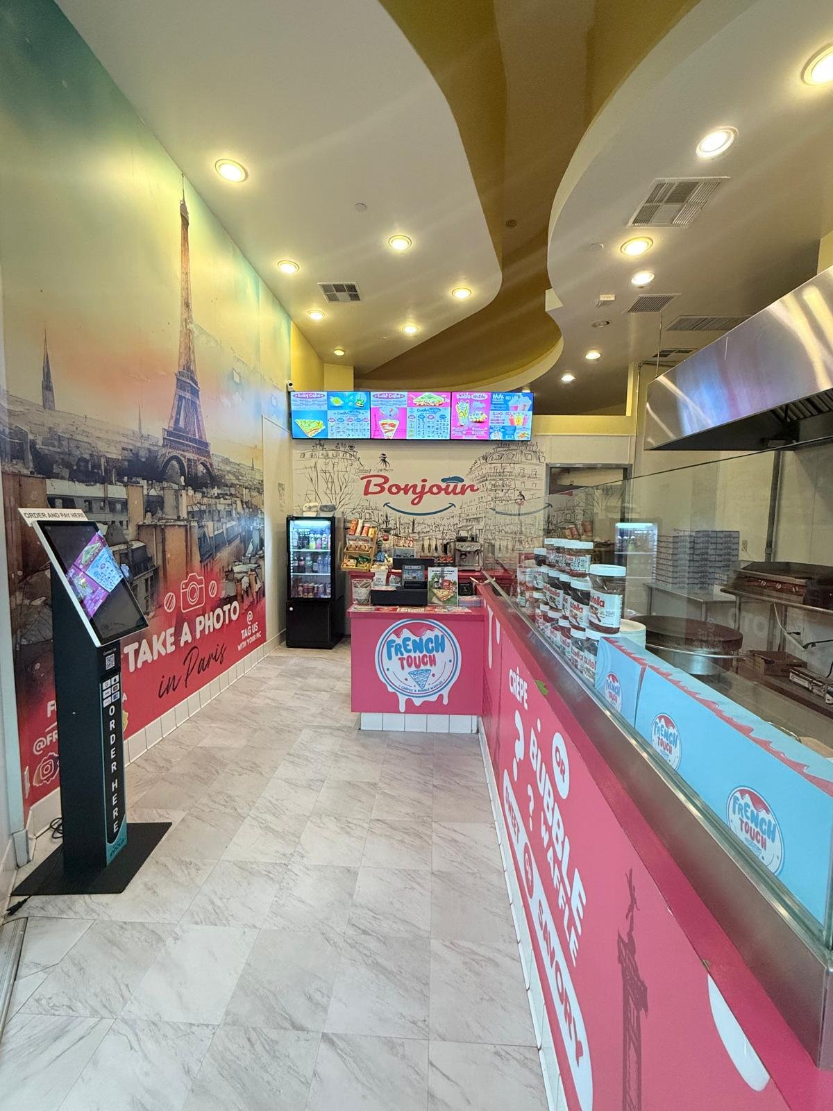 Interior counter and menu boards at French Touch Manhattan Beach inside Manhattan Village